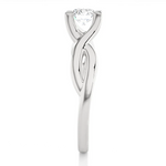 Load image into Gallery viewer, side profile of 0.50 Ct Moissanite Twisted Solitaire Engagement Ring In White Gold highlights the criss cross setting.
