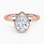 Load image into Gallery viewer, 1.50 Ct Pear Cut Moissanite Bezel Set Engagement Ring in Yellow Gold