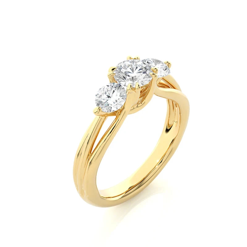 2 carat 3 stone round cut moissanite ring in yellow gold