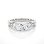 Load image into Gallery viewer, Front view of 2 Carat 3 Stone Round Cut Moissanite Ring in White Gold, highlighting the brilliant center moissanite stone.