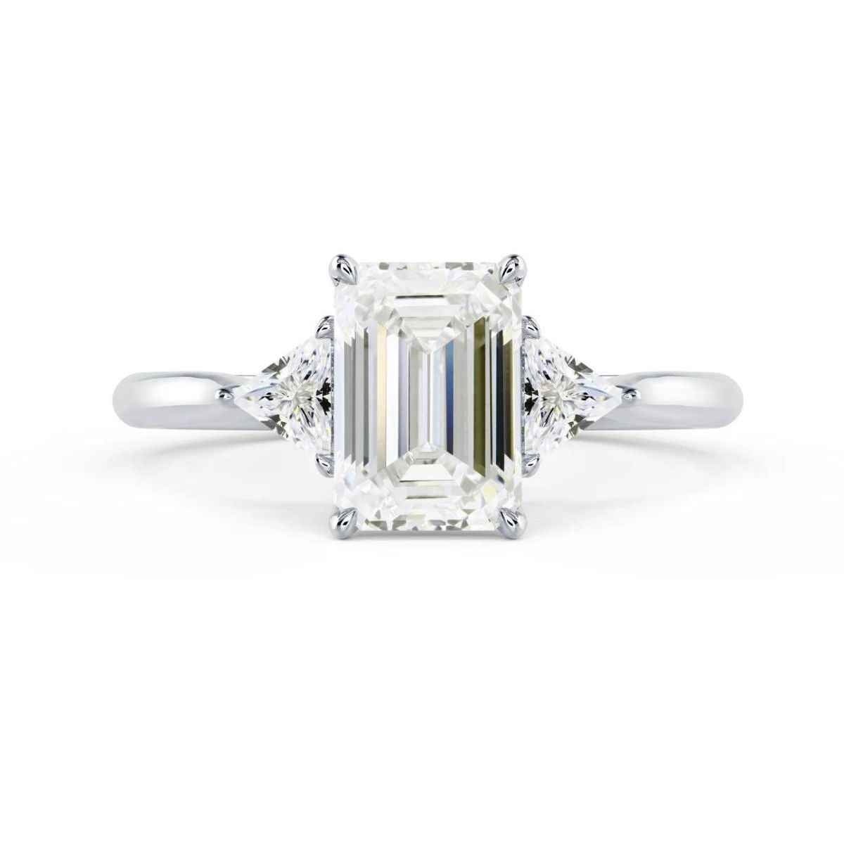 2 carat emerald & trillion cut moissanite three stone ring in white gold