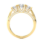 Load image into Gallery viewer, Side profile of 2 Ct Moissanite 3 Stone Engagement Ring With Accents in Yellow Gold, highlighting the prong setting.
