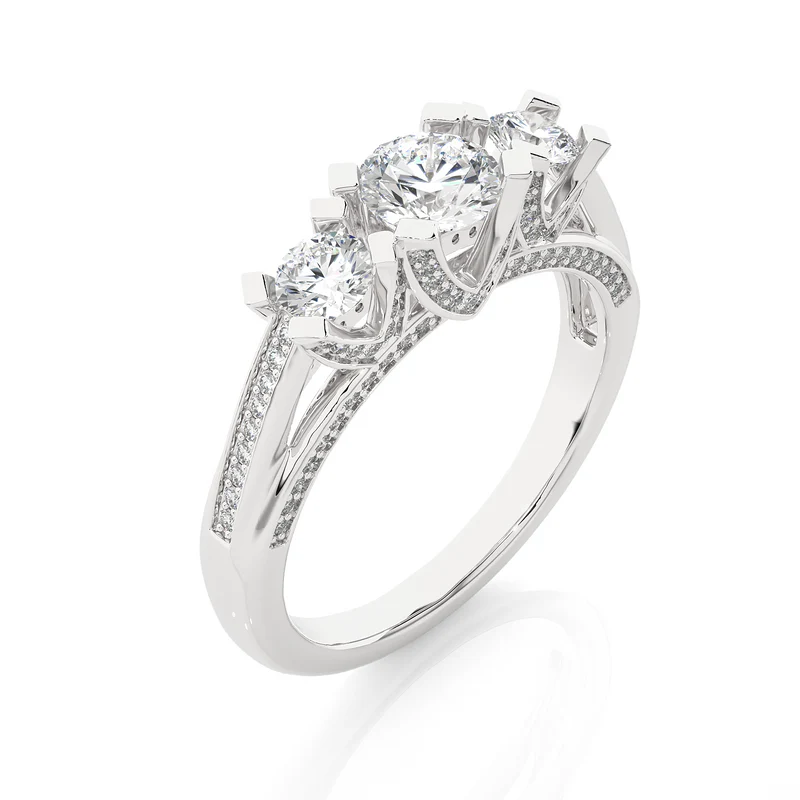 Angled view of 2 ct moissanite 3 stone engagement ring with accent in silver, showcasing the band and setting