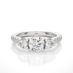 Load image into Gallery viewer, Front view of 2 Carat Round Moissanite Engagement Three Stone Ring In White Gold, highlighting the brilliant center moissanite stone.
