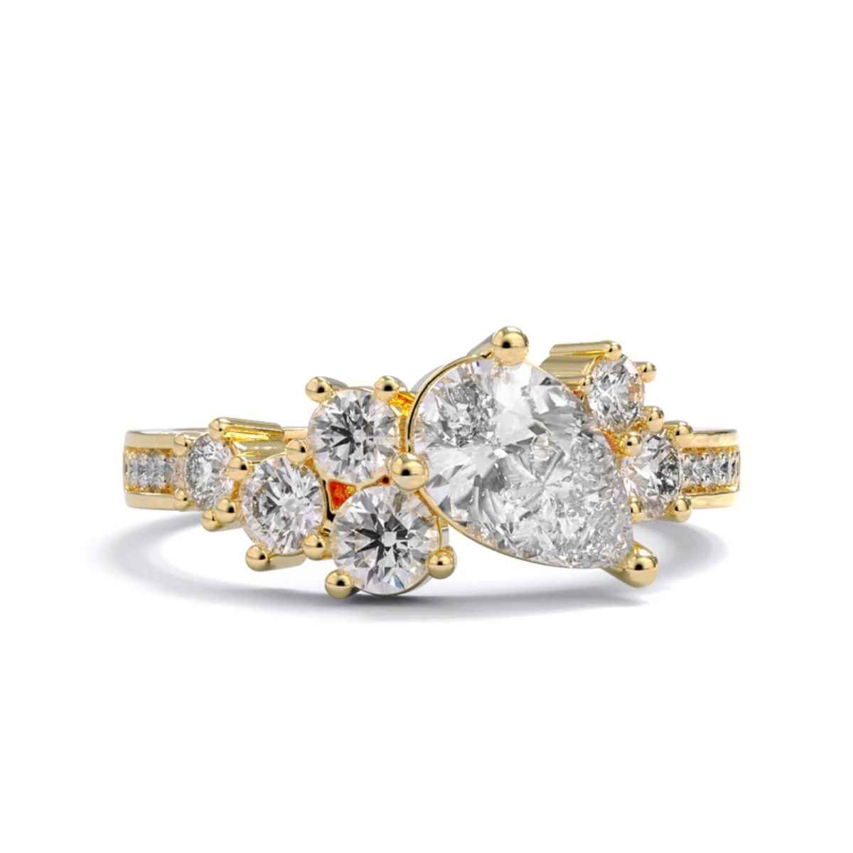 2 carat pear and round shape moissanite cluster ring in yellow gold