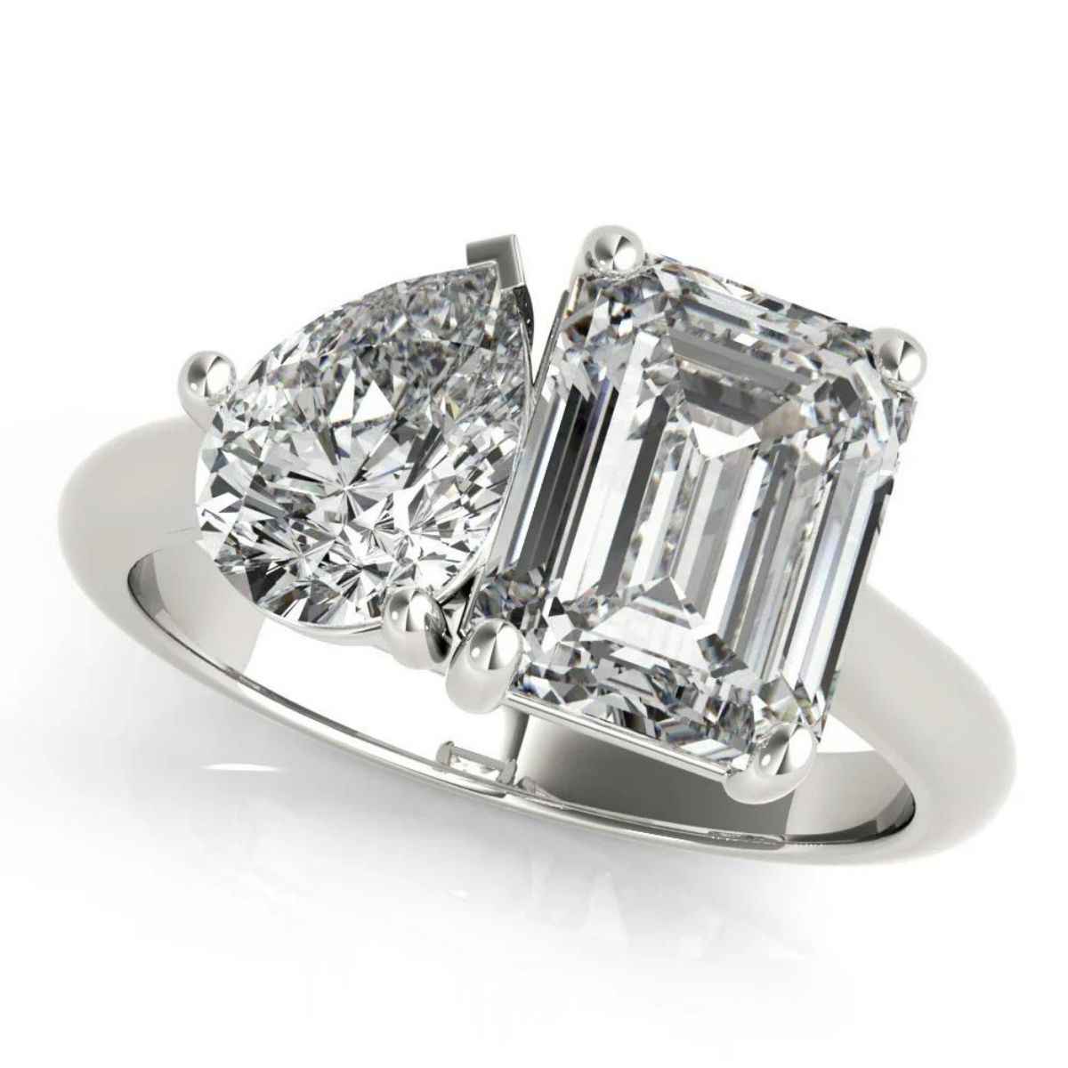 3 carat emerald & pear cut moissanite toi et moi ring in white gold