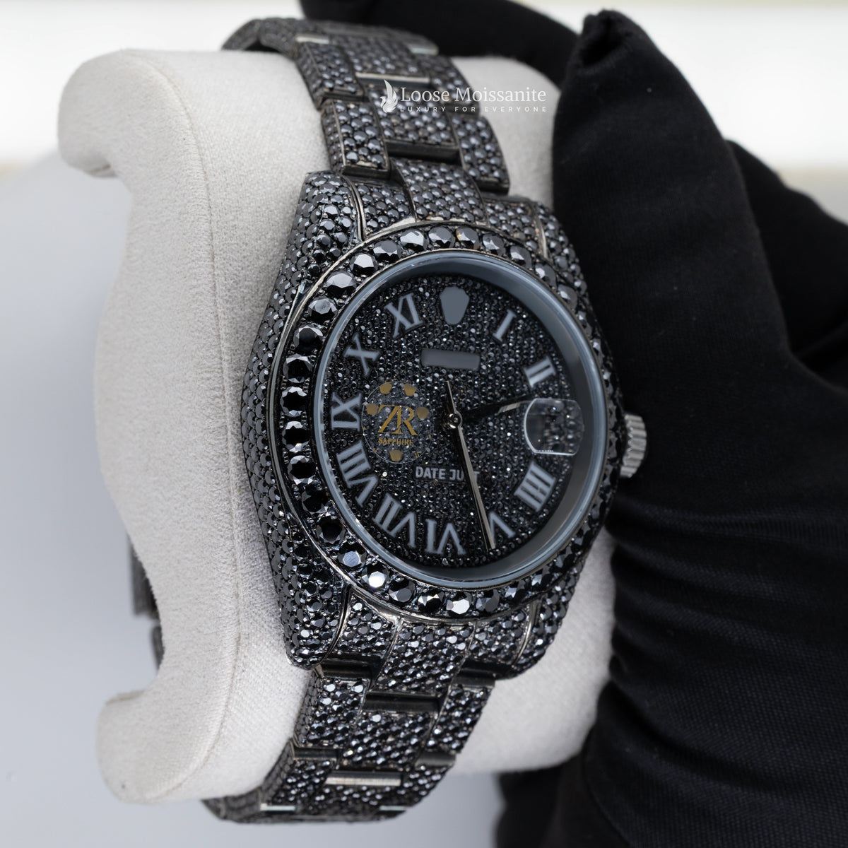 Side view of black diamond watch