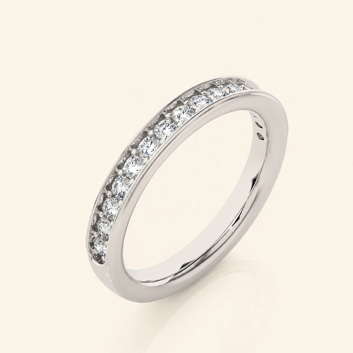 Angle view of round half eternity band