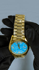 Load image into Gallery viewer, Close up View Of Oyster Perpetual Day-Date Sky Blue Dial Plain Watch In Yellow Gold