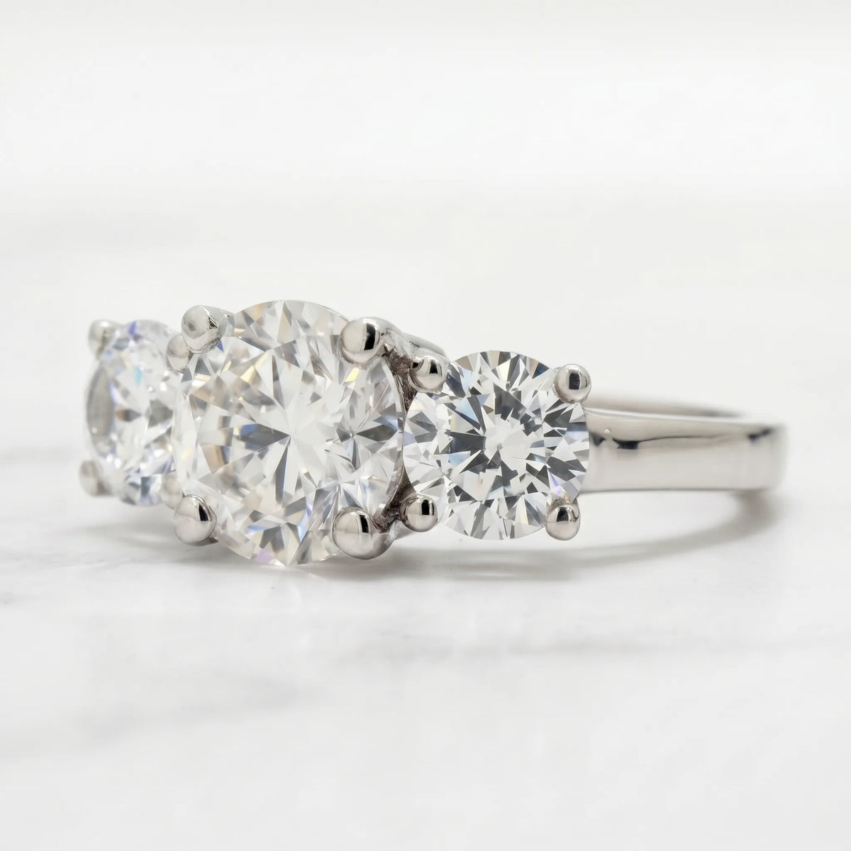2 ct moissanite round three stone engagement ring in silver