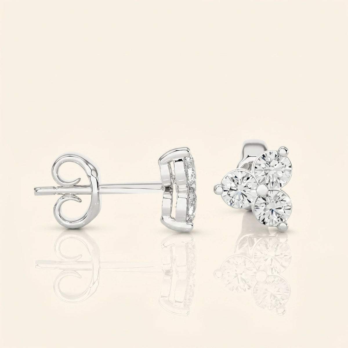 Boucles d'oreilles clous trois pierres