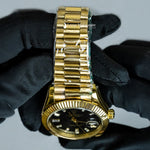 Load image into Gallery viewer, Close Up View Of Oyster Perpetual Day-Date Black Dial Plain Watch In Yellow Gold