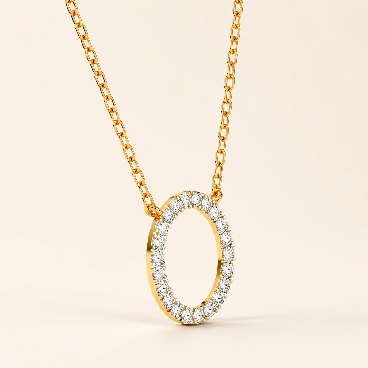 Side view of prong set circle necklace