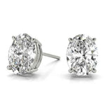 Load image into Gallery viewer, 0.50 - 5 Carat Oval Cut Solitaire Moissanite Stud Earrings in Yellow Gold