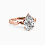 Load image into Gallery viewer, 1.50 Carat Pear Cut Solitaire Moissanite Twisted Ring in Rose Gold