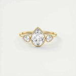 Load image into Gallery viewer, 2 Carat Pear Cut Three Stone Bezel Set Moissanite Ring in Rose Gold