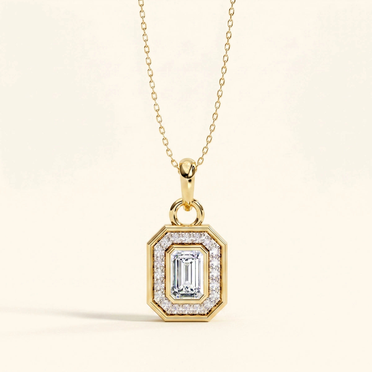 Emerald cut halo necklace