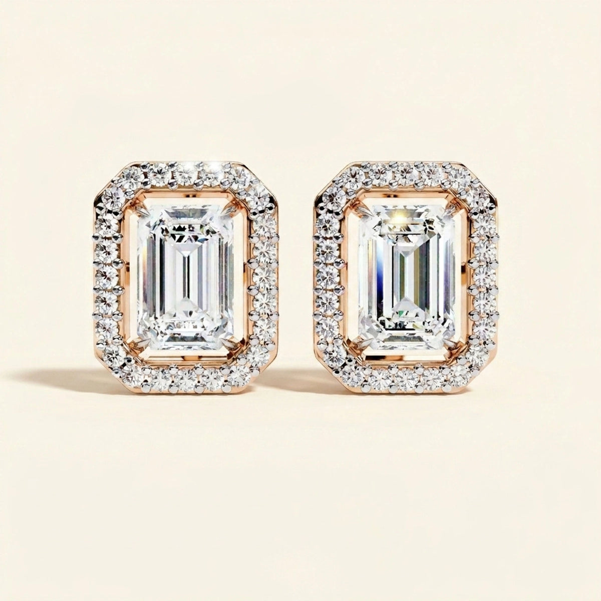 Front view of emerald cut halo stud earrings