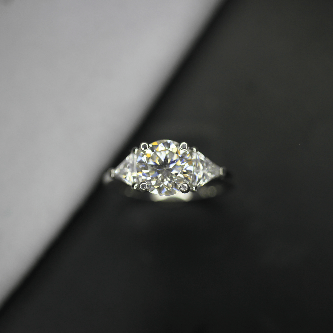3 carat round and trillion cut moissanite three stone ring