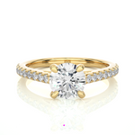 Load image into Gallery viewer, Front view of 1.20 Ct Round Cut Moissanite Cathedral Set Engagement Ring In Yellow Gold, highlighting the brilliant center Moissanite stone.