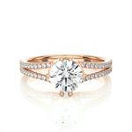Load image into Gallery viewer, Front view of 1.40 Ct Round Cut Moissanite Split Shank Engagement Ring In Rose Gold, highlighting the brilliant center moissanite stone.
