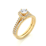 Load image into Gallery viewer, Angled view of 1.50 Carat Halo Moissanite Bridal Set With Accents in Yellow Gold, showcasing the band and setting.