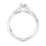 Load image into Gallery viewer, Side profile of Front view of 1.50 Ct Round Cut Moissanite French V-Split Engagement Ring In Silver, highlighting the brilliant center moissanite stone., highlighting the prong setting.