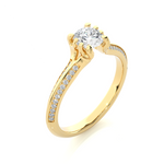 Load image into Gallery viewer, Angled view of 1.50 Ct Round Cut Moissanite Two Row Accent Engagement Ring In Yellow Gold, showcasing the band and setting.
