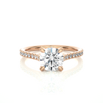 Load image into Gallery viewer, Front view of 1.50 Ct Round Moissanite Hidden Halo Engagement Ring In Rose Gold, highlighting the brilliant center Moissanite stone.