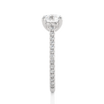 Load image into Gallery viewer, Side profile of 1.50 Ct Round Moissanite Hidden Halo Engagement Ring In White Gold, highlighting the brilliant center moissanite stone., highlighting the prong setting.