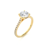 Load image into Gallery viewer, Angled view of 1.50 Ct Round Moissanite Hidden Halo Engagement Ring In Yellow Gold, showcasing the band and setting.