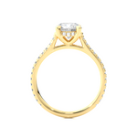 Load image into Gallery viewer, Side profile of 1.50 Ct Round Moissanite Hidden Halo Engagement Ring In Yellow Gold, highlighting the brilliant center moissanite stone., highlighting the prong setting.