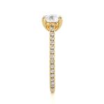 Load image into Gallery viewer, Side profile of 1.50 Ct Round Moissanite Hidden Halo Engagement Ring In Yellow Gold, highlighting the brilliant center moissanite stone., highlighting the prong setting.