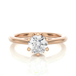 Load image into Gallery viewer, Front view of 1.50 Ct Round Moissanite Solitaire Engagement Ring In Rose Gold, highlighting the brilliant center Moissanite stone.