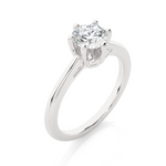 Load image into Gallery viewer, Angled view of 1.50 Ct Round Moissanite Solitaire Engagement Ring In Silver, showcasing the band and setting.