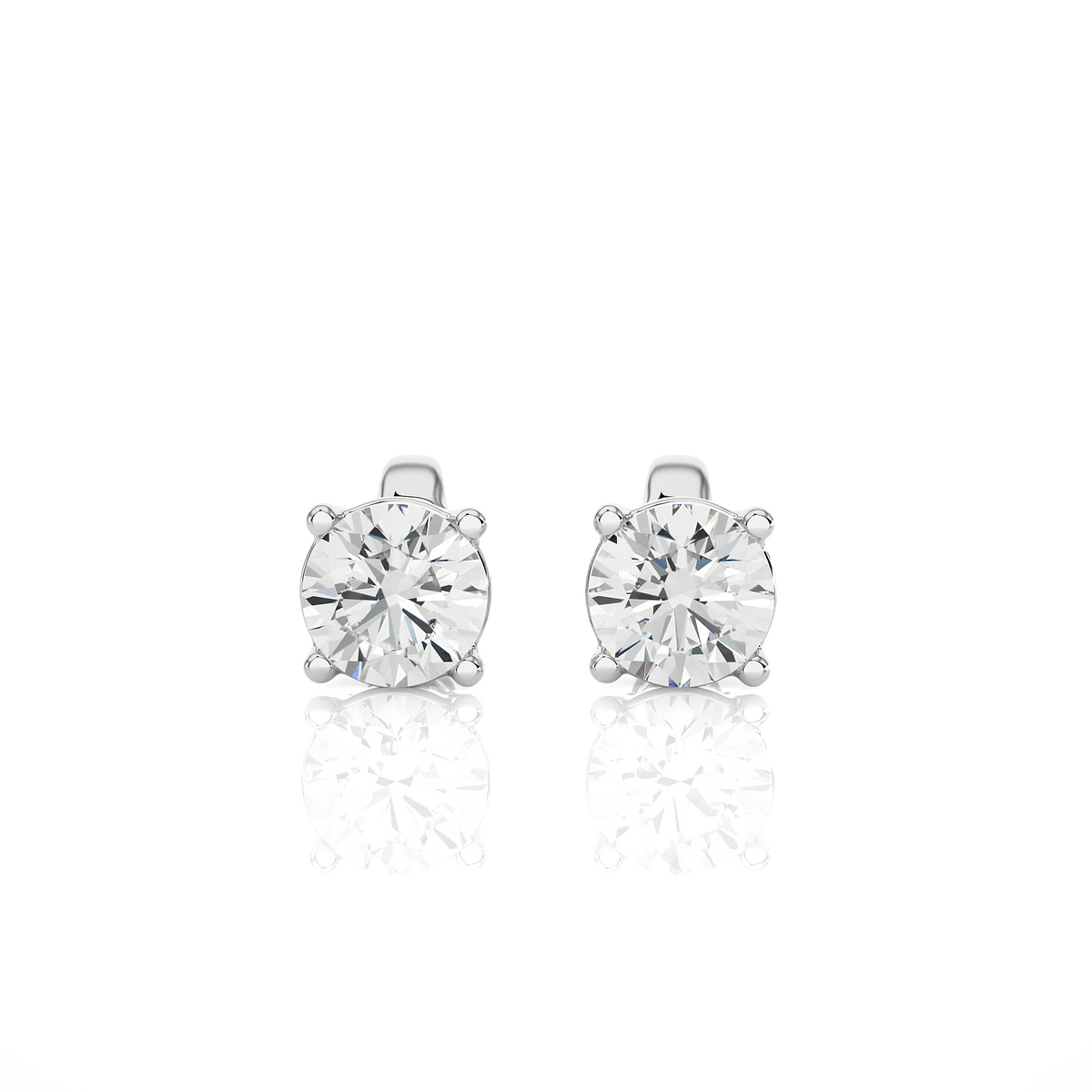 Front view of 1 carat four prong round cut moissanite stud earrings in white gold, with classic four prong setting