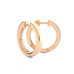 Load image into Gallery viewer, Angled view of 1 Carat Round Moissanite Channel Set Hoop Earrings In Rose Gold, showing brilliance and curved shape.