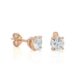 Load image into Gallery viewer, Side view of 1 Ct Basket Set Moissanite Stud Earrings In Rose Gold, highlighting prong height and earring profile.