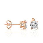 Load image into Gallery viewer, Side view of 1 Ct Basket Set Moissanite Stud Earrings In Rose Gold, highlighting prong height and earring profile.