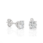 Load image into Gallery viewer, Side view of 1 Ct Basket Set Moissanite Stud Earrings In White Gold, highlighting prong height and earring profile.