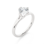 Load image into Gallery viewer, Angled view of 1 Ct Round Moissanite Solitaire Engagement Ring In White Gold, showcasing the band and setting.