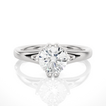 Load image into Gallery viewer, Front view of 1 Ct Round Moissanite Solitaire Engagement Ring In White Gold, highlighting the brilliant center moissanite stone.