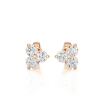 Load image into Gallery viewer, Front view of 2 Carat Round Cut Moissanite Three Stone Stud Earrings In Rose Gold, showing full sparkle.