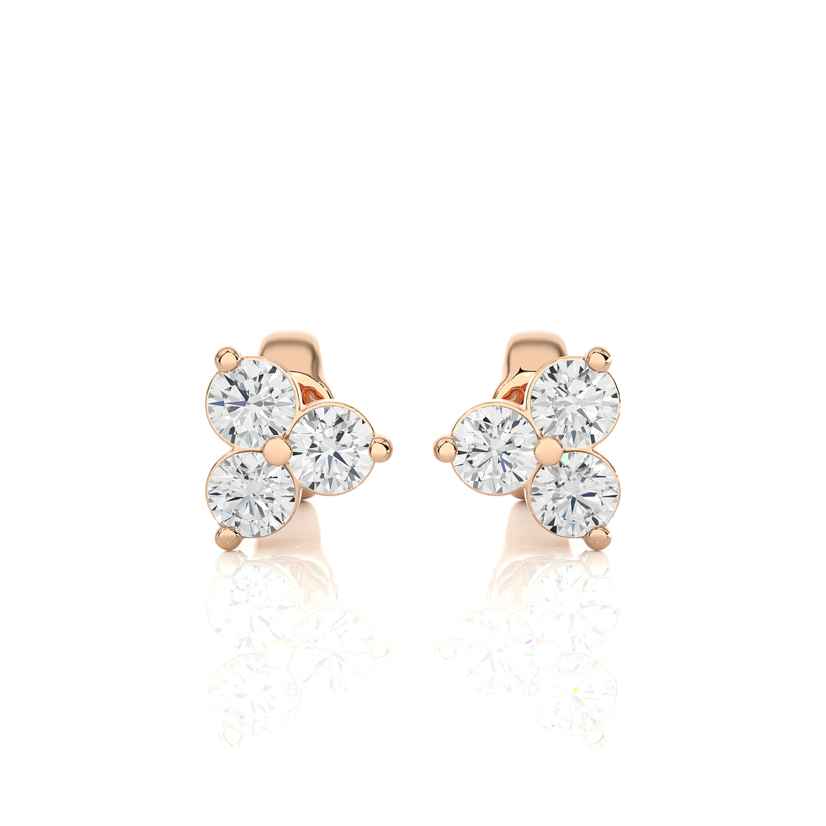 Front view of 2 carat round cut moissanite three stone stud earrings in rose gold, showing full sparkle