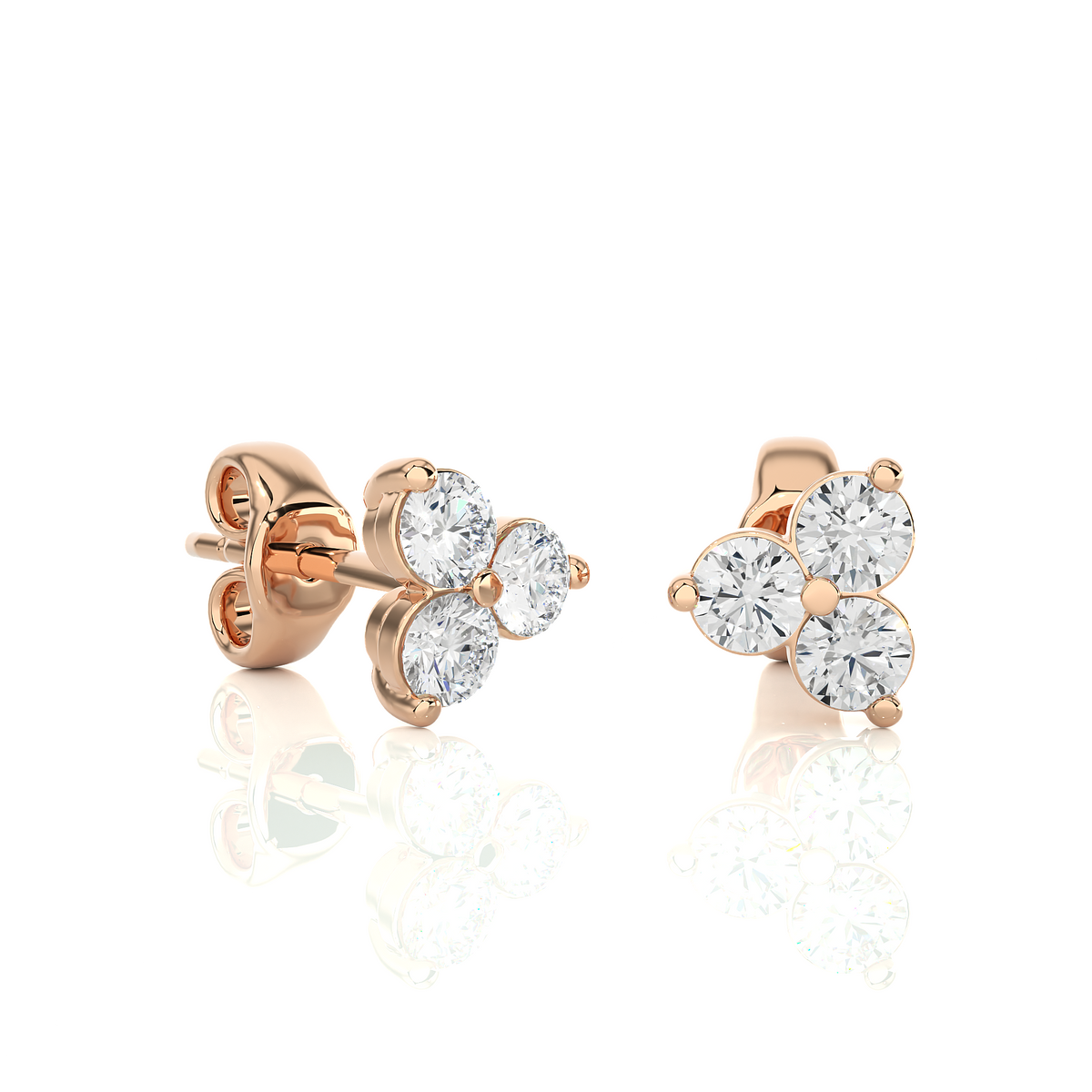 Side view of 2 carat round cut moissanite three stone stud earrings in rose gold, showing depth and setting details