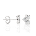 Load image into Gallery viewer, Side view of 2 Carat Round Cut Moissanite Three Stone Stud Earrings In Silver, showing depth and setting details.