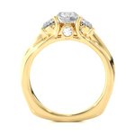 Load image into Gallery viewer, Side profile of 2 Ct Round Moissanite Three Stone Engagement Ring In Yellow Gold, highlighting the brilliant center moissanite stone., highlighting the prong setting.