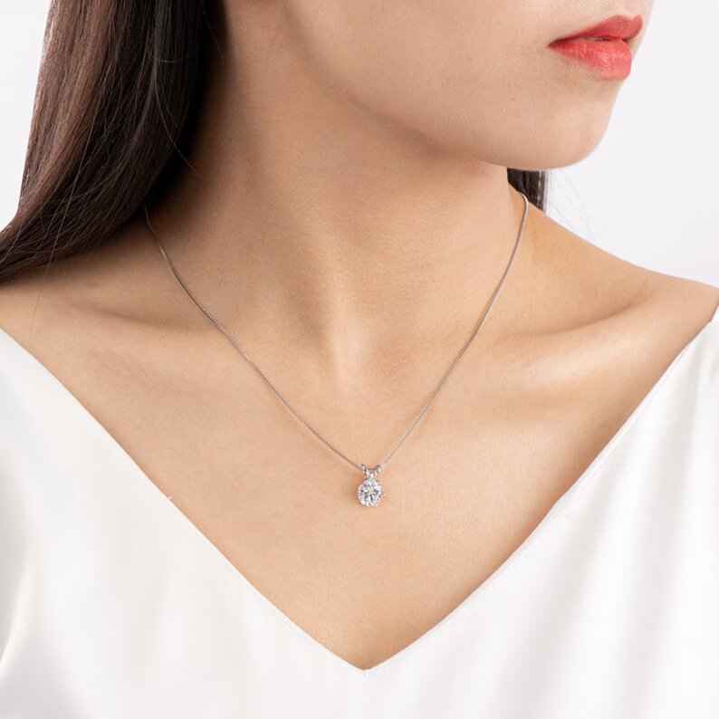 2 carat round cut solitaire moissanite solitaire pendant in silver