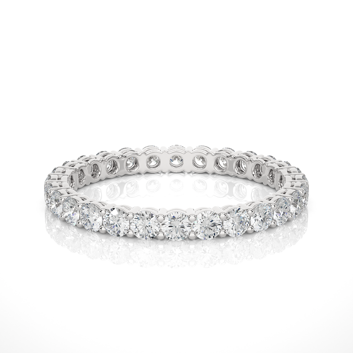 1 ct round moissanite surface prong eternity band in silver