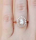 Load image into Gallery viewer, 2 Ct Oval Shaped Moissanite Double Halo Engagement Ring In Rose Gold